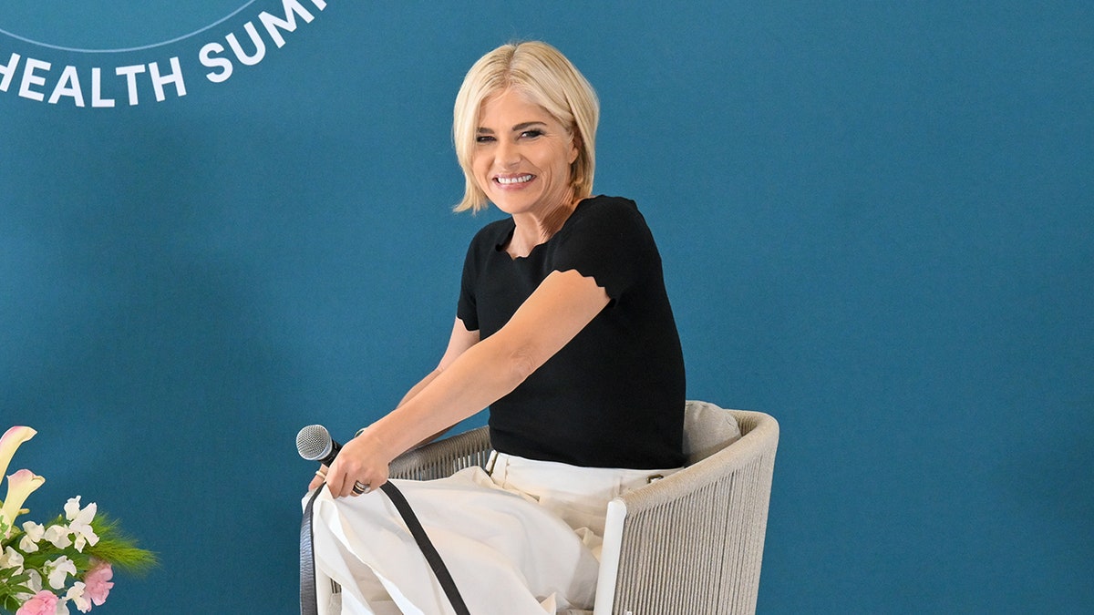 Selma Blair smiles and speaks onstage during a panel at the Flow Space Women's Health Summit in Los Angeles, California.