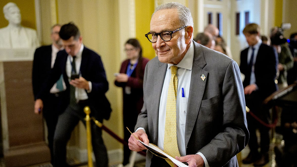 Senate Minority Leader Chuck Schumer, D-N.Y., leaving a press conference.