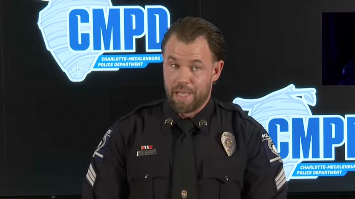 Sergeant Todd Martin speaking at a press conference