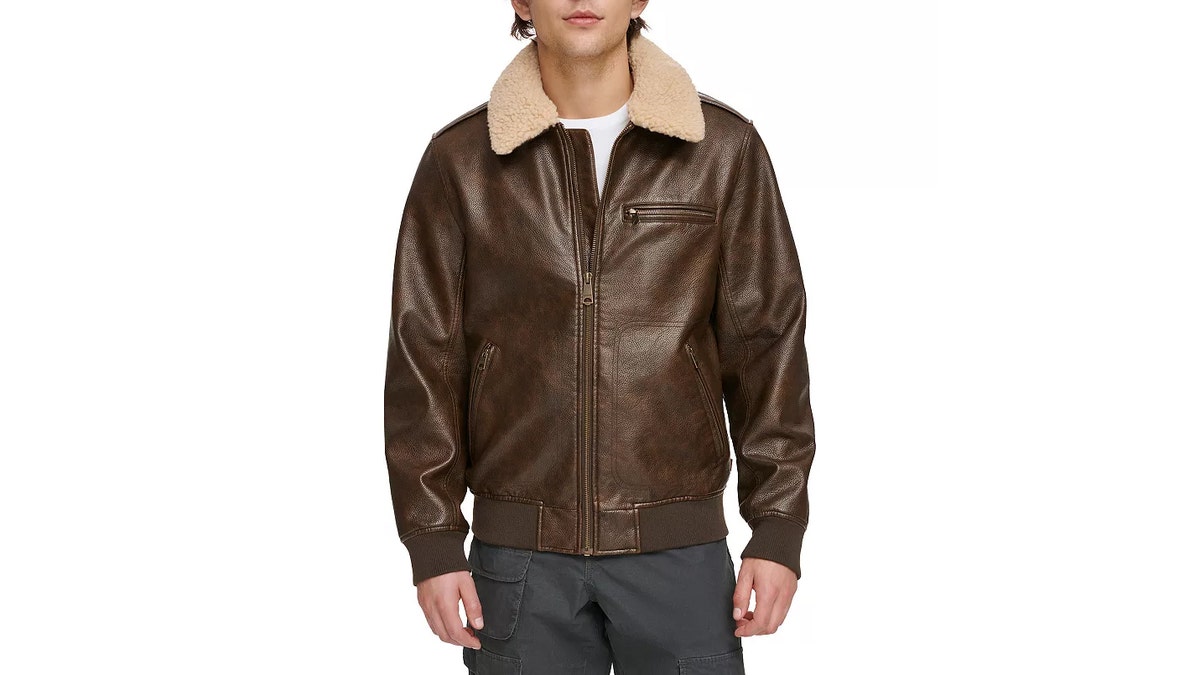 Stay warm while looking cool with this Levi’s faux leather sherpa-lined trucker jacket.