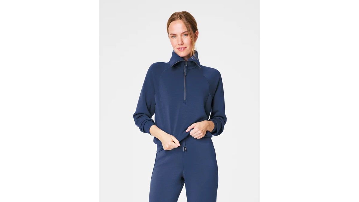 Pair this half-zip with the wide leg pants for a matching set.