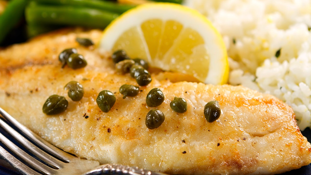 Pan-seared tilapia with lemon and capers.