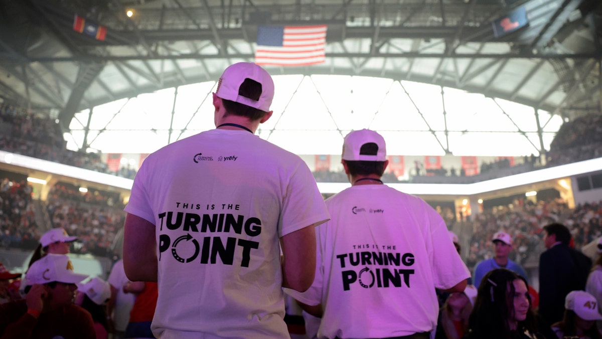 Attendees wear Turning Point USA shirts at Ole Miss event