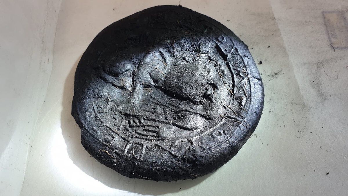 Ancient bread loaf with Christ depiction