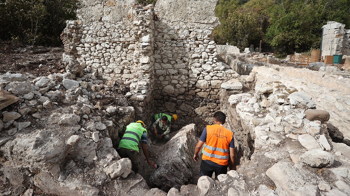 Ancient bishop's luxury bathhouse unearthed in Turkey by archaeologists 1 Archaeologists digging among ancient stones