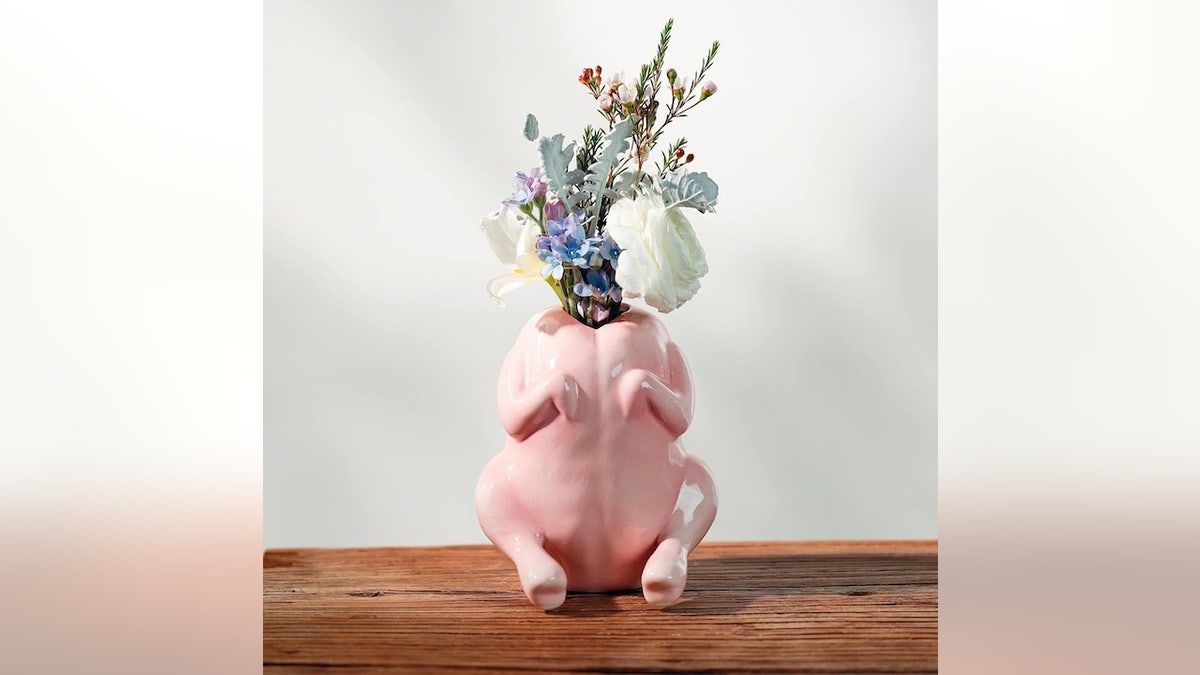 An eye-catching ceramic vase with a glossy finish.