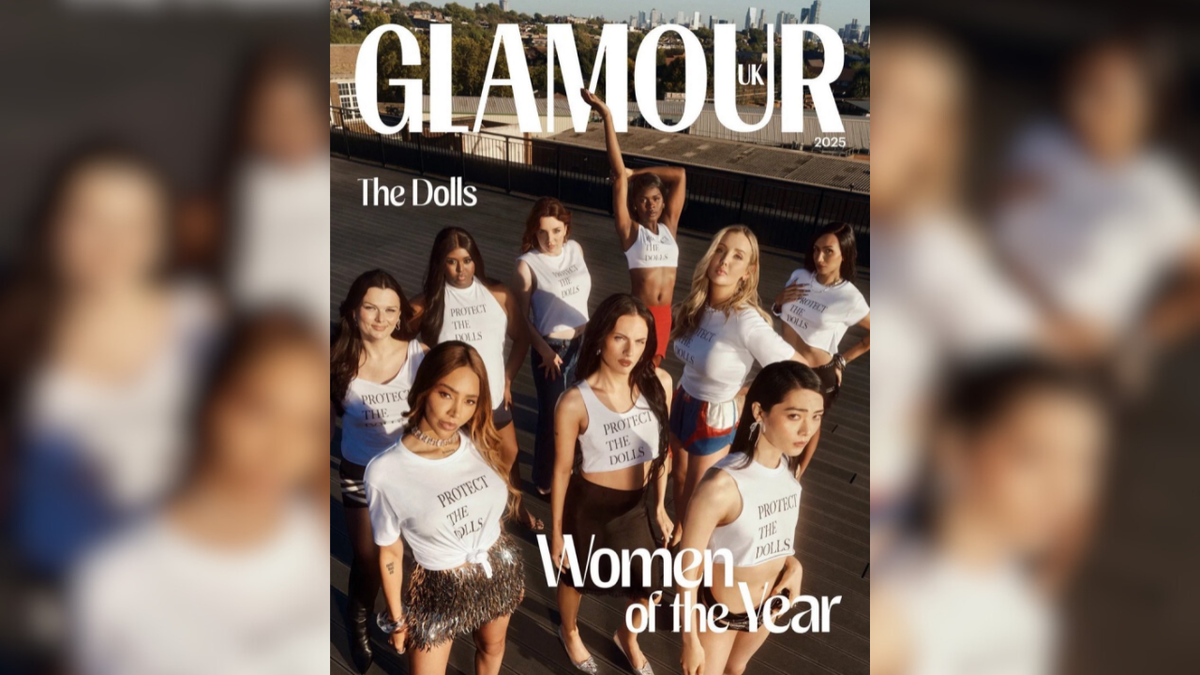 Nine transgender women wearing white tops posing for UK Glamour