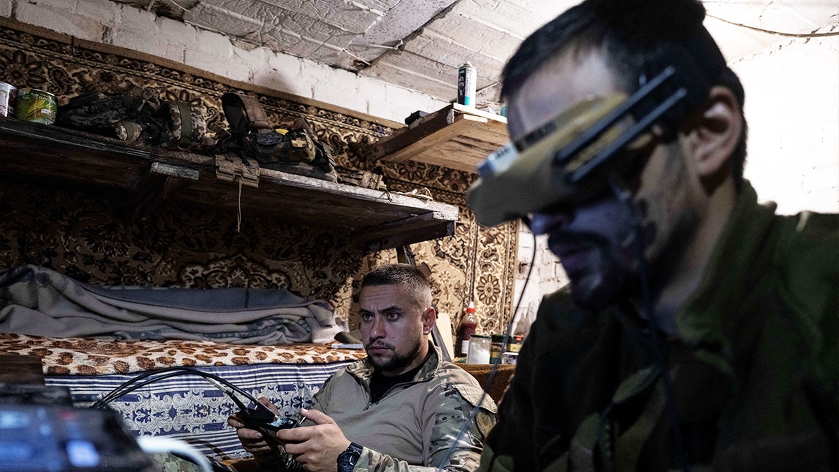 A Serviceman of the 93rd Kholodnyi Yar Separate Mechanized Brigade of the Ukrainian Armed Forces operates a first-person view (FPV) drone during its flight over positions of Russian troops, amid Russia's attack on Ukraine, near the frontline town of Kostiantynivka, Donetsk region, Ukraine