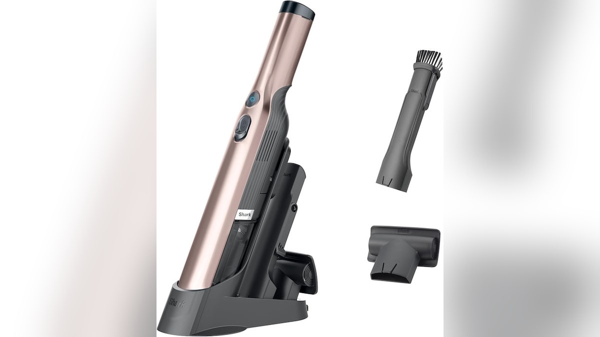 This handheld vacuum is sleek, lightweight and has a modern design.