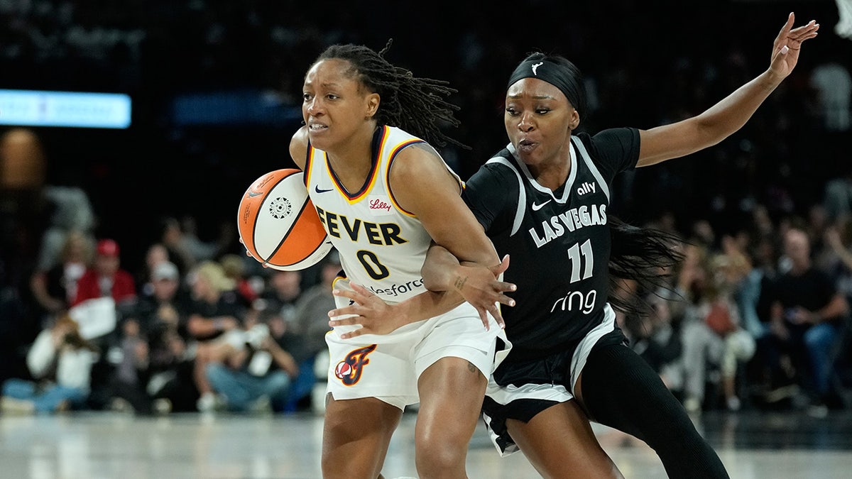 Kelsey Mitchell drives to the basket