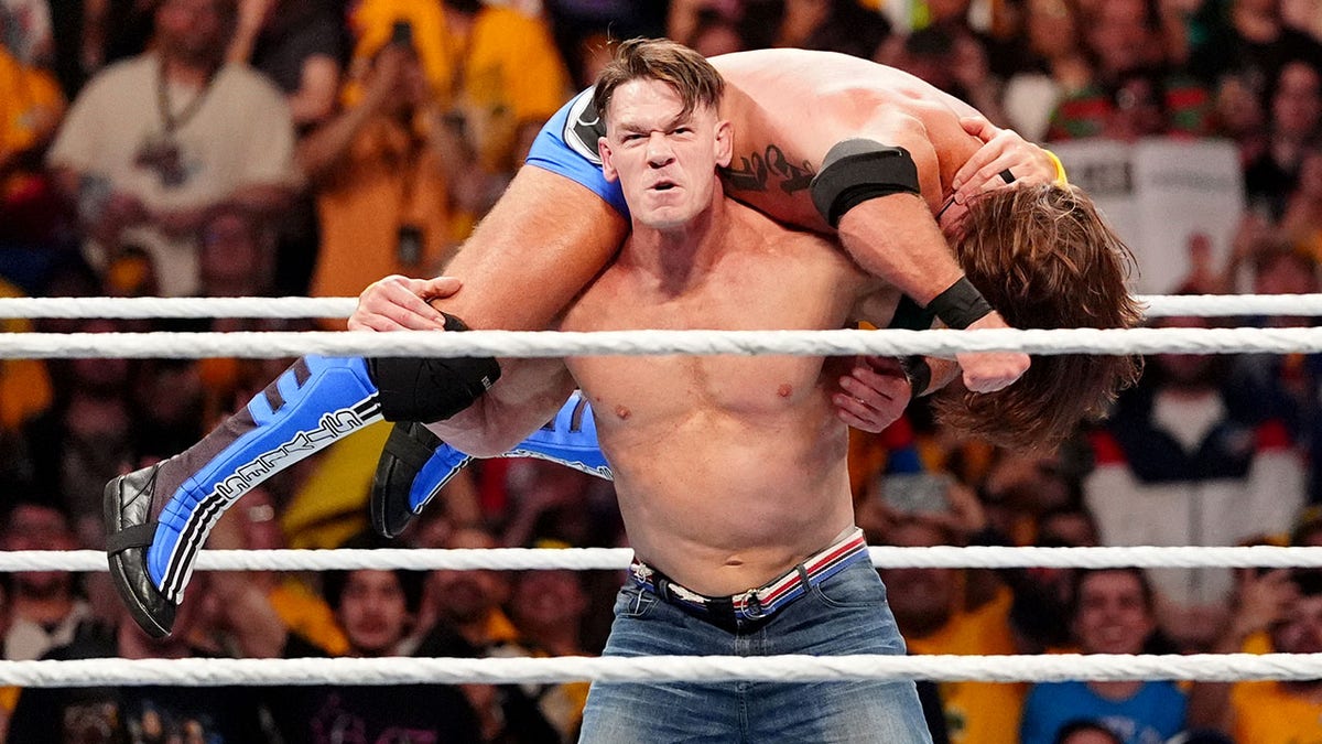 John Cena lifts AJ Styles