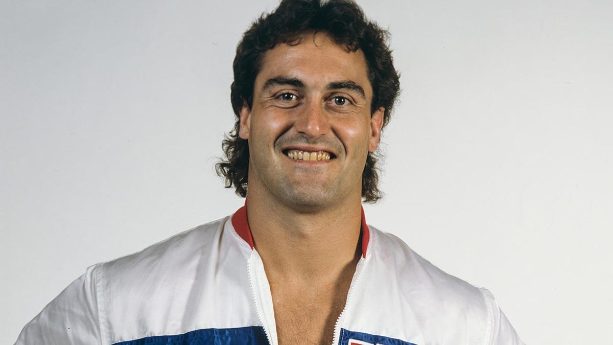 Mike Rotunda wearing a USA jacket
