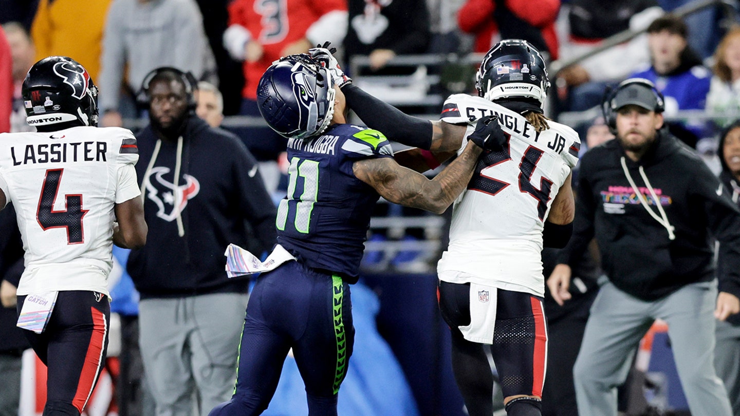 NFL official goes viral after stepping in to protect Seahawks’ Jaxon Smith-Njigba during sideline scuffle