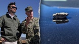 Shrapnel on patrol car on the right, JD Vance at Camp Pendleton on the right