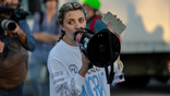 Kat Abughazaleh protests outside an ICE facility