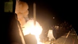 A Tomahawk cruise missile is launched against ISIL targets from the US Navy guided-missile destroyer USS Arleigh Burke, in the Red Sea