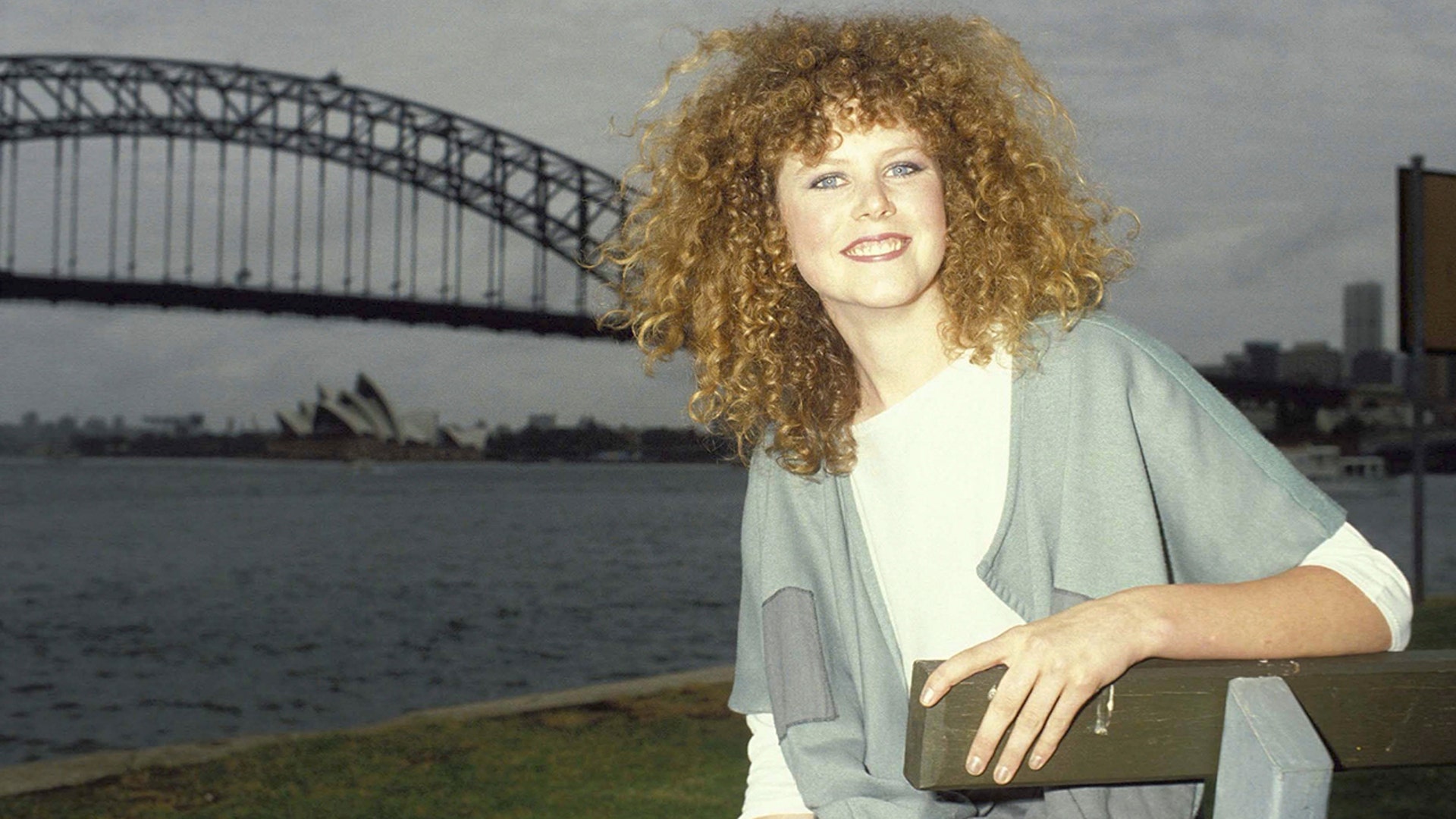 Nicole Kidman in Sydney, Australia in front of water in December 1983.