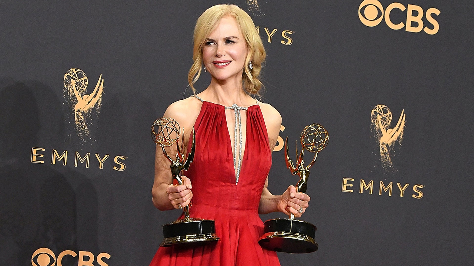Nicole Kidman holding her Emmy Awards in 2017.