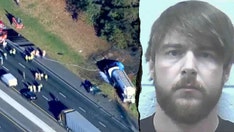 Truck driver arrested on homicide charges in fiery wreck that killed 8 family members