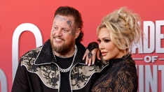 Jelly Roll's wife offers prayers to critic who slammed her decision to stay with country star after affair