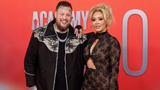 Jelly Roll's wife slams trolls who criticized her for trashing country music scene