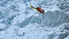 Blizzard traps hundreds on Mount Everest as rescue teams race to save lives