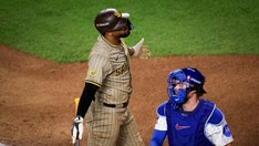 Padres players held back after confronting umpires following controversial season-ending loss to Cubs