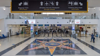 Passengers startled as airport system breached with anti-Trump messages - Fox News