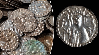 Angler digging for fishing worms uncovers massive medieval treasure in hidden cauldron