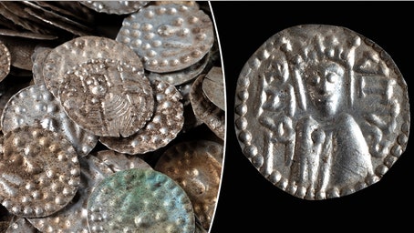 Angler digging for fishing worms uncovers massive medieval treasure in hidden cauldron