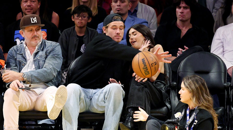 Justin Herbert and Madison Beer in a candid moment