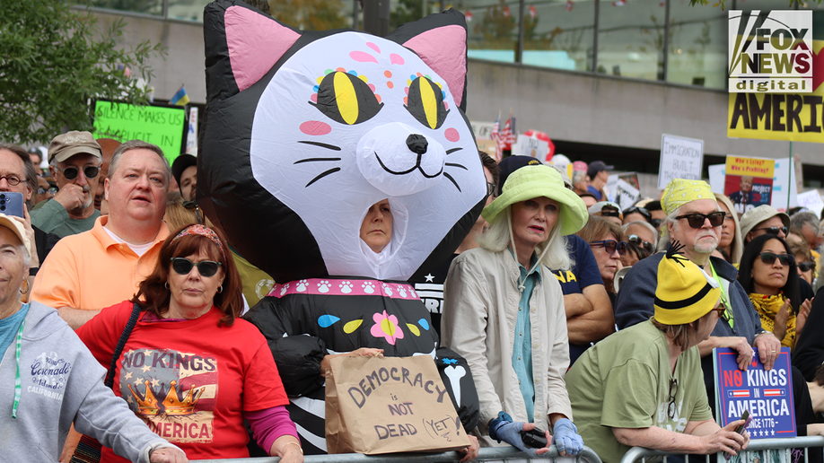 In Photos: Bernie Sanders, costumed demonstrators rally against Trump at No Kings Day protest  at george magazine