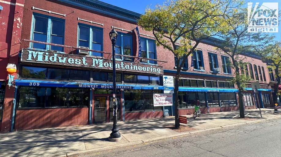 Shuttered Midwest Mountaineering storefront on Cedar Avenue