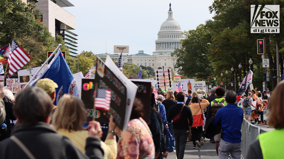 In Photos: Bernie Sanders, costumed demonstrators rally against Trump at No Kings Day protest  at george magazine