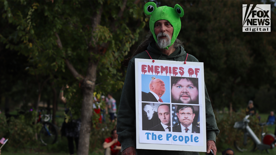 In Photos: Bernie Sanders, costumed demonstrators rally against Trump at No Kings Day protest  at george magazine