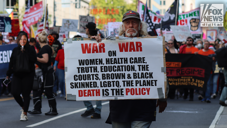In Photos: Bernie Sanders, costumed demonstrators rally against Trump at No Kings Day protest  at george magazine