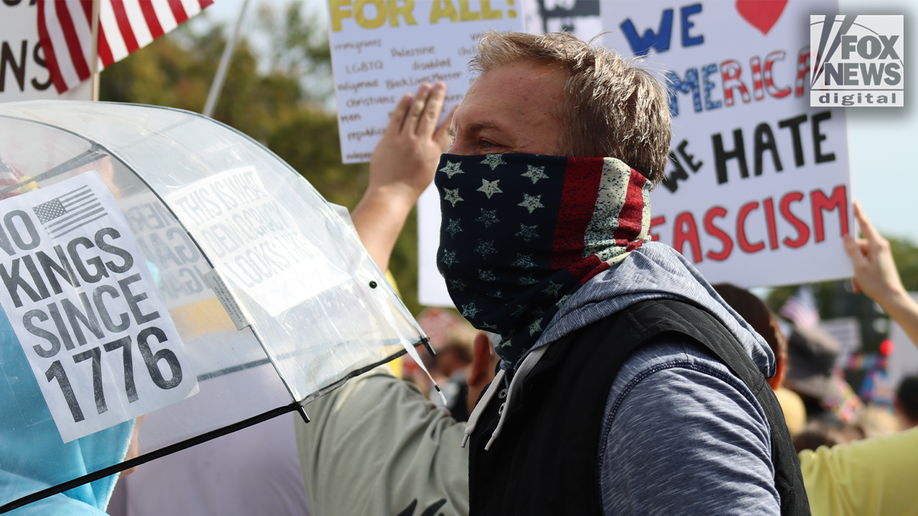 In Photos: Bernie Sanders, costumed demonstrators rally against Trump at No Kings Day protest  at george magazine