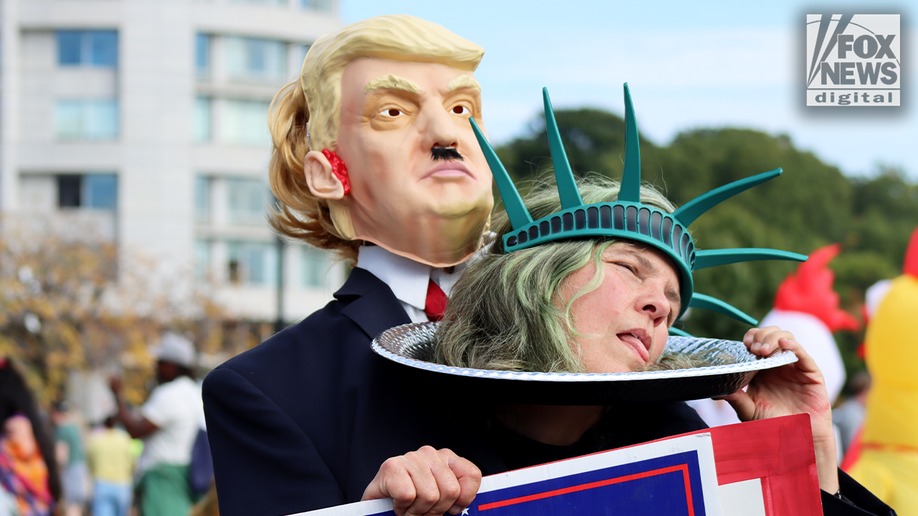 In Photos: Bernie Sanders, costumed demonstrators rally against Trump at No Kings Day protest  at george magazine