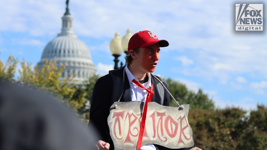 In Photos: Bernie Sanders, costumed demonstrators rally against Trump at No Kings Day protest  at george magazine