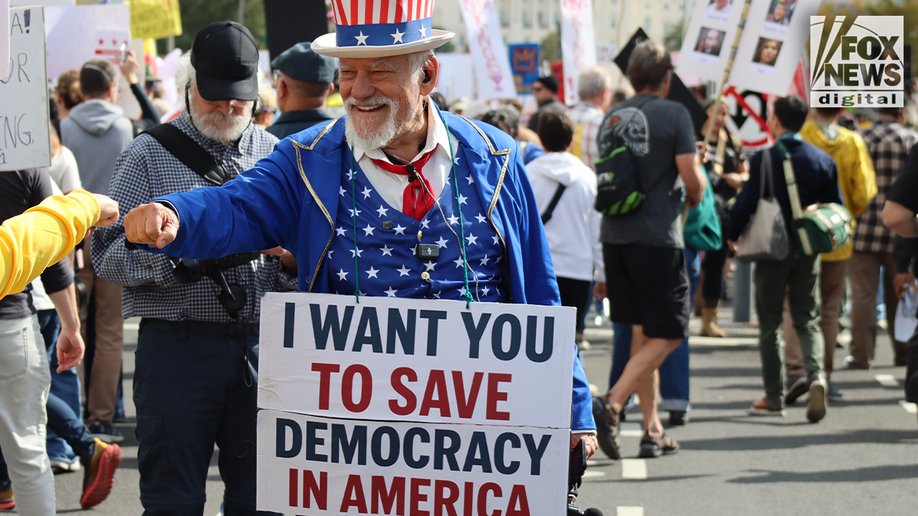 In Photos: Bernie Sanders, costumed demonstrators rally against Trump at No Kings Day protest  at george magazine