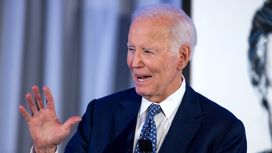 Biden claims nation facing 'dark days' as he accepts lifetime achievement award