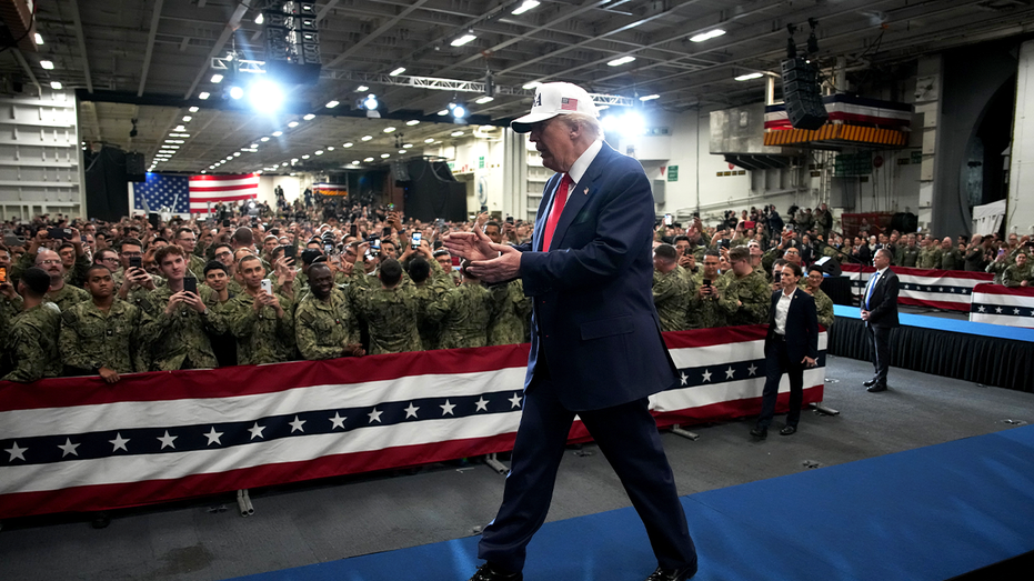 Trump rallies US military's might, floats armed forces pay raise in address to troops in Japan