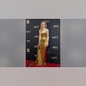 Nicole Kidman in a gold dress at the AFI Life Achievement Award Gala Tribute in April 2024.