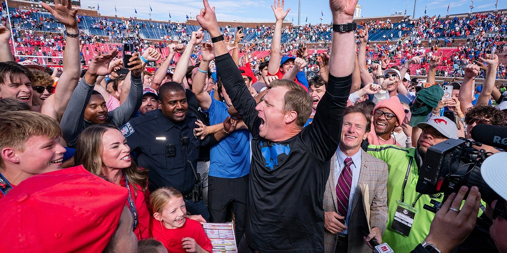 SMU stuns No 10 Miami in overtime after quarterback Carson Beck throws goal-line interception