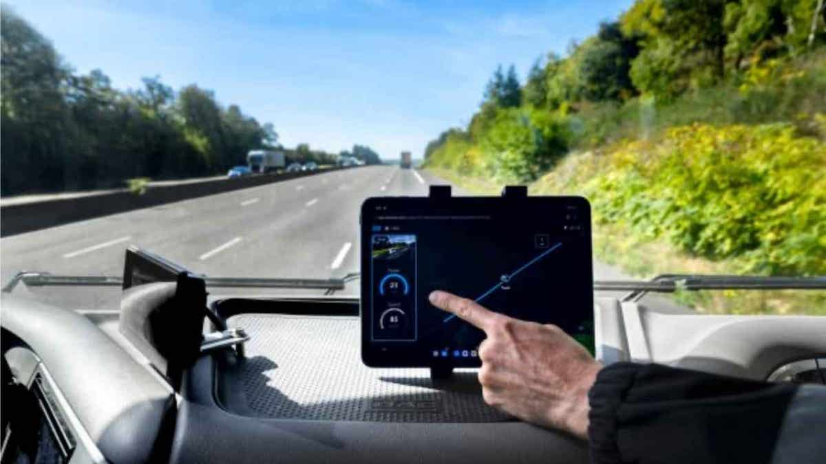 Coils built into the street charge the EV.