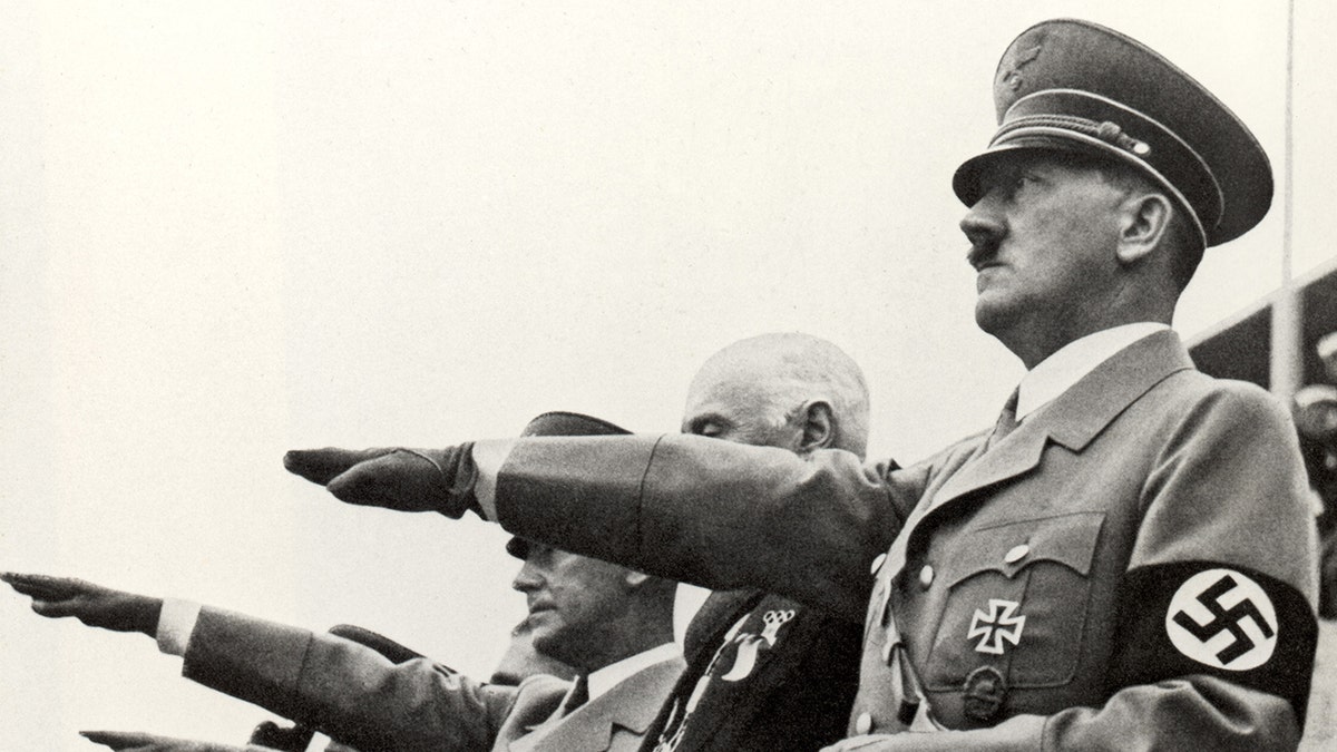 Adolf Hitler salutes