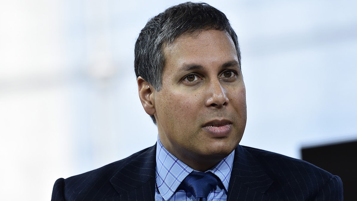 Avik Roy speaks at a conference