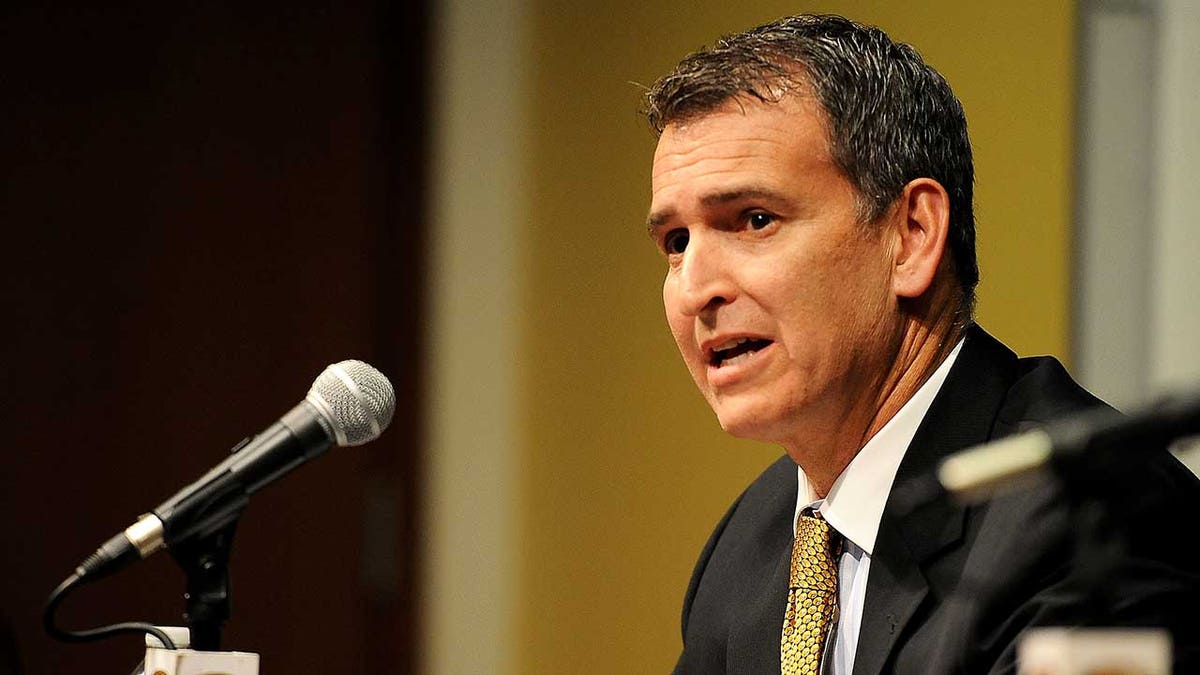 University of Missouri-Columbia Athletic Director Mack Rhoades speaks to the media during a quality    league  connected  field  arsenic  University of Missouri System President Tim Wolfe resigned amid protests implicit    radical   tensions astatine  the assemblage   successful  Columbia, Missouri, connected  Nov. 9, 2015.