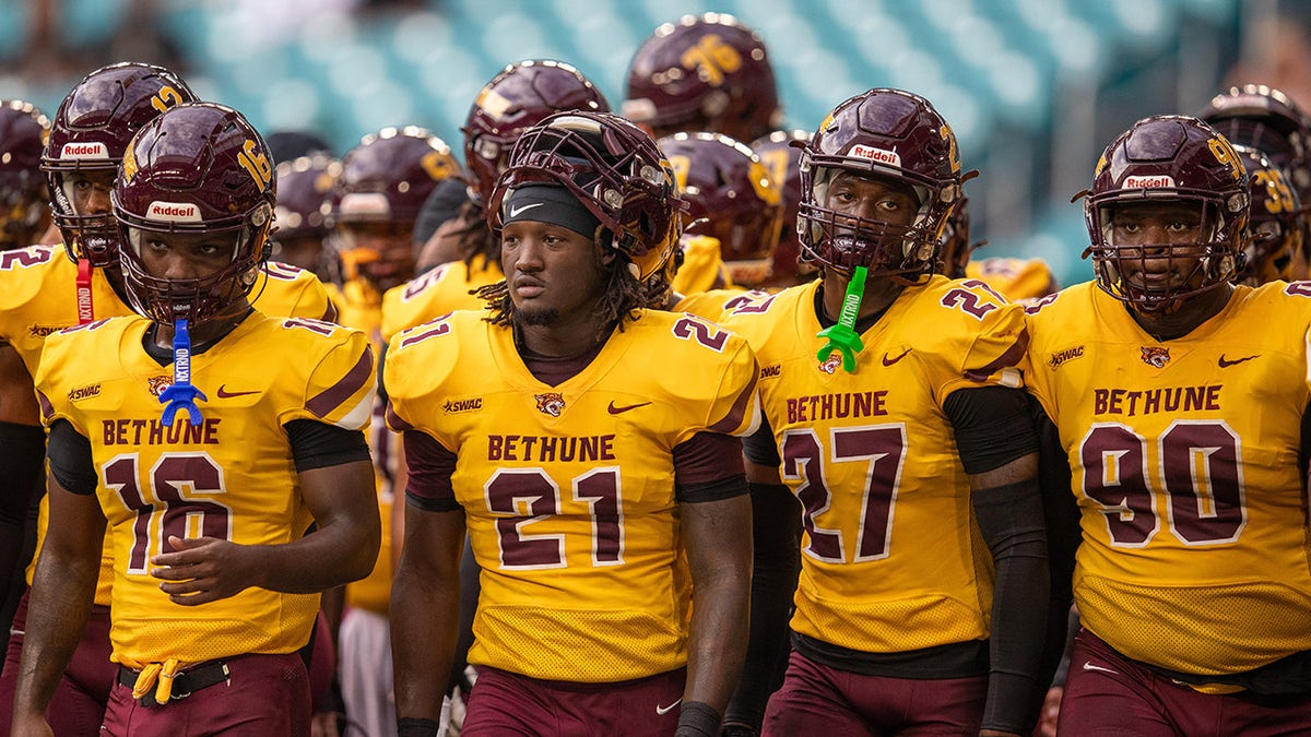 Bethune-Cookman players come out to the field