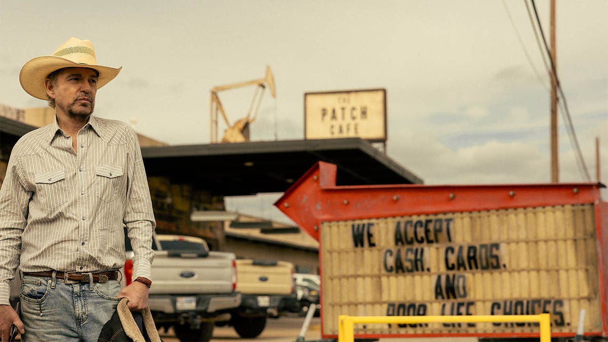 Billy Bob Thornton stands by oil rig in "Landman"